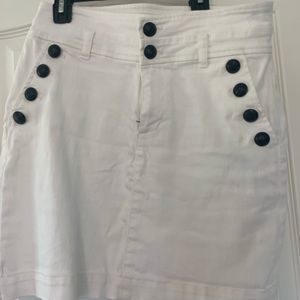 White skirt with black buttons